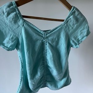Braided blouse with ruched back